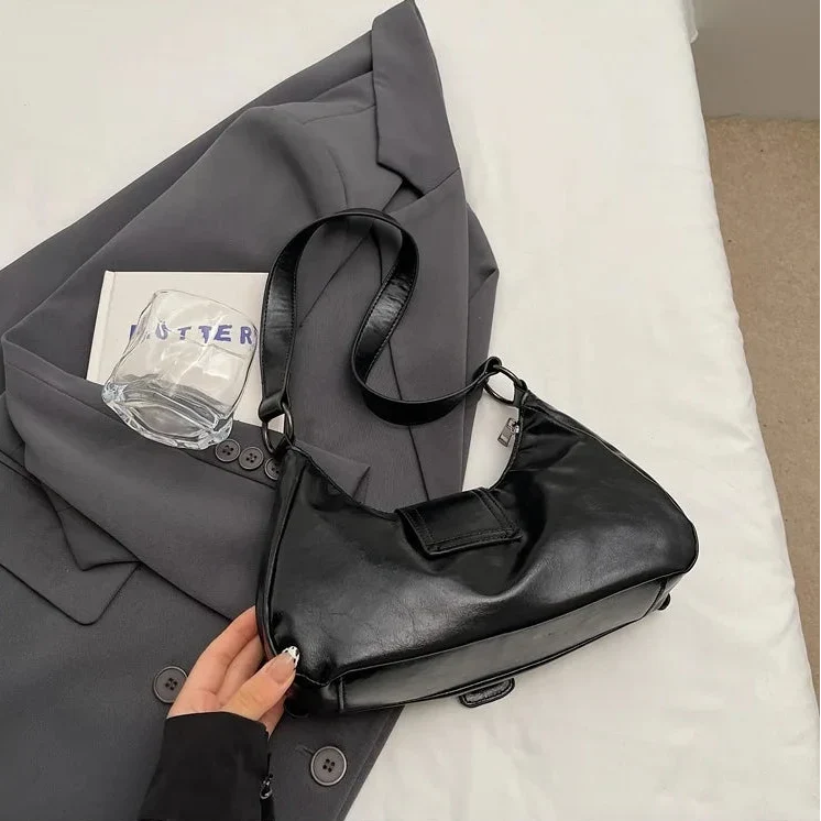 Millie - Sac à boucle en cuir
